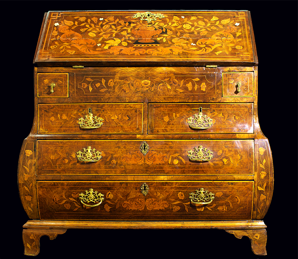 A restored 18th century antique bureau with intricate inlay. This highly valuable furniture was restored by ARC services on the QLD Gold Coast.